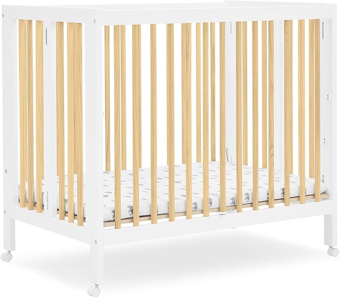 Delta Children Mia Portable Folding Mini Crib with 1.5-Inch Mattress - Greenguard Gold Certified, Bianca White/Natural