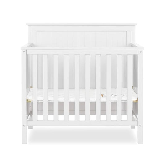 Ava 4-in-1 Convertible Mini Crib in White, Greenguard Gold Certified, Non-Toxic Finish, Comes with 1" Mattress Pad, with 3 Mattress Height Settings