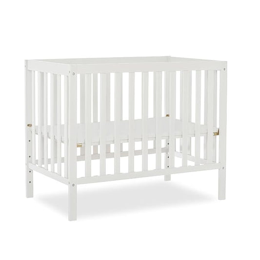 Edgewood 4-In-1 Convertible Mini Crib In White, JPMA Certified, Non-Toxic Finish, New Zealand Pinewood, With 3 Mattress Height Settings, Included 1" Mattress Pad