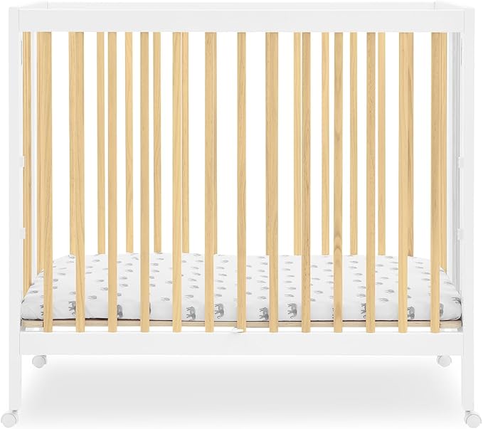 Delta Children Mia Portable Folding Mini Crib with 1.5-Inch Mattress - Greenguard Gold Certified, Bianca White/Natural