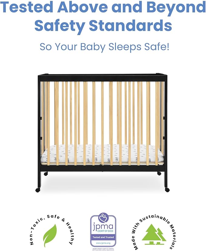 Delta Children Mia Portable Folding Mini Crib with 1.5-Inch Mattress - Greenguard Gold Certified, Ebony Black/Natural