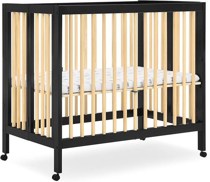 Delta Children Mia Portable Folding Mini Crib with 1.5-Inch Mattress - Greenguard Gold Certified, Ebony Black/Natural
