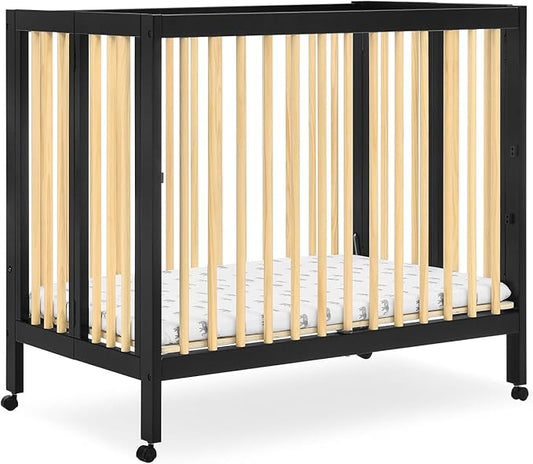 Delta Children Mia Portable Folding Mini Crib with 1.5-Inch Mattress - Greenguard Gold Certified, Ebony Black/Natural