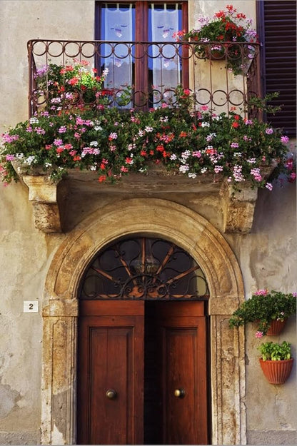 ART.COM Stretched Canvas Print Balcony Flowers and Doorway in Pienza Tuscany Italy by Julian Castle, 16" x 24"