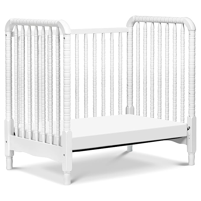 DaVinci Jenny Lind 3-in-1 Convertible Mini Crib in White, Removable Wheels, Greenguard Gold Certified