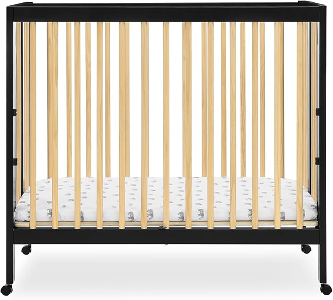 Delta Children Mia Portable Folding Mini Crib with 1.5-Inch Mattress - Greenguard Gold Certified, Ebony Black/Natural
