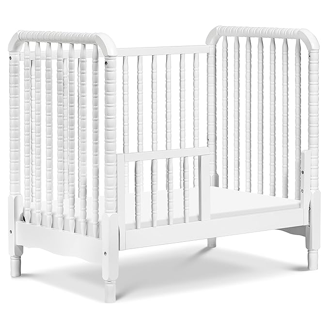 DaVinci Jenny Lind 3-in-1 Convertible Mini Crib in White, Removable Wheels, Greenguard Gold Certified