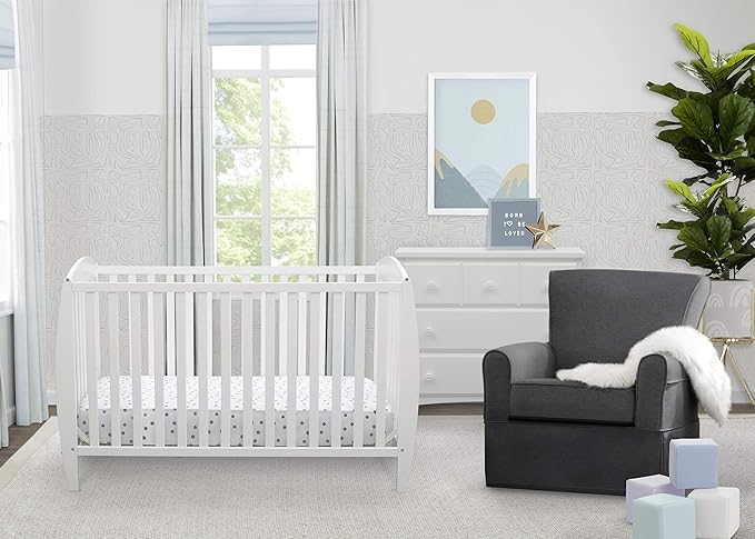 Delta Children Twinkle 4-in-1 Convertible Baby Crib, Sustainable New Zealand Wood, White and Delta Children Twinkle Galaxy Dual Sided Recycled Fiber Core Crib and Toddler Mattress (Bundle)