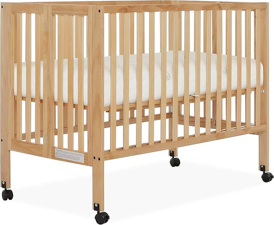 Quinn Full-Size Folding Crib in Natural, Removeable Wheels, Modern Nursey, Adjustable Mattress Support, Portable Crib, Patented Folding System