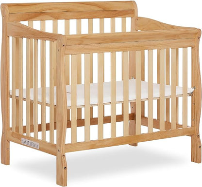 Aden 4-in-1 Convertible Mini Crib in Natural, Greenguard Gold Certified & Sunset 3” Extra Firm Fiber Crib Mattress, Greenguard Gold Certified, Waterproof Vinyl Cover