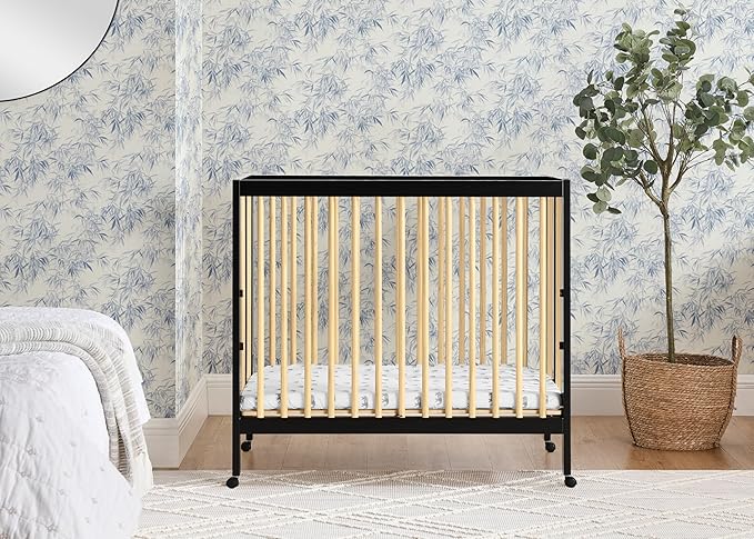 Delta Children Mia Portable Folding Mini Crib with 1.5-Inch Mattress - Greenguard Gold Certified, Ebony Black/Natural